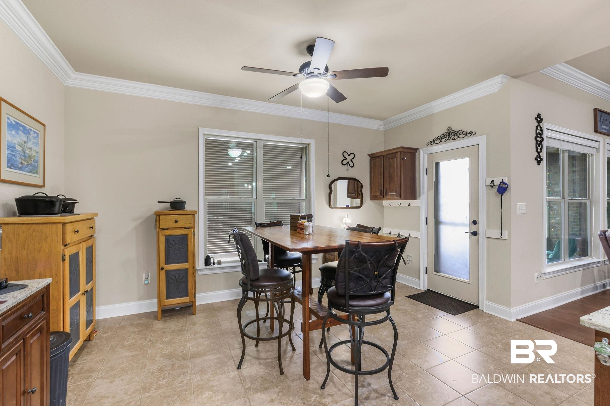1086 Destin Avenue Foley, AL 36535 - Photo 5 of 30 Dining room with ornamental molding, light hardwood / wood-style floors, and ceiling fan