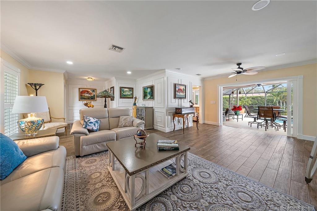 8 North River Road Stuart, FL 34996 - Photo 9 of 42 a living room with furniture and a table
