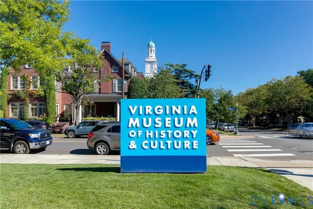 a view of a car park in front of house