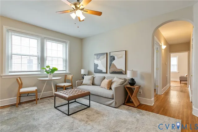 a living room with furniture and a window