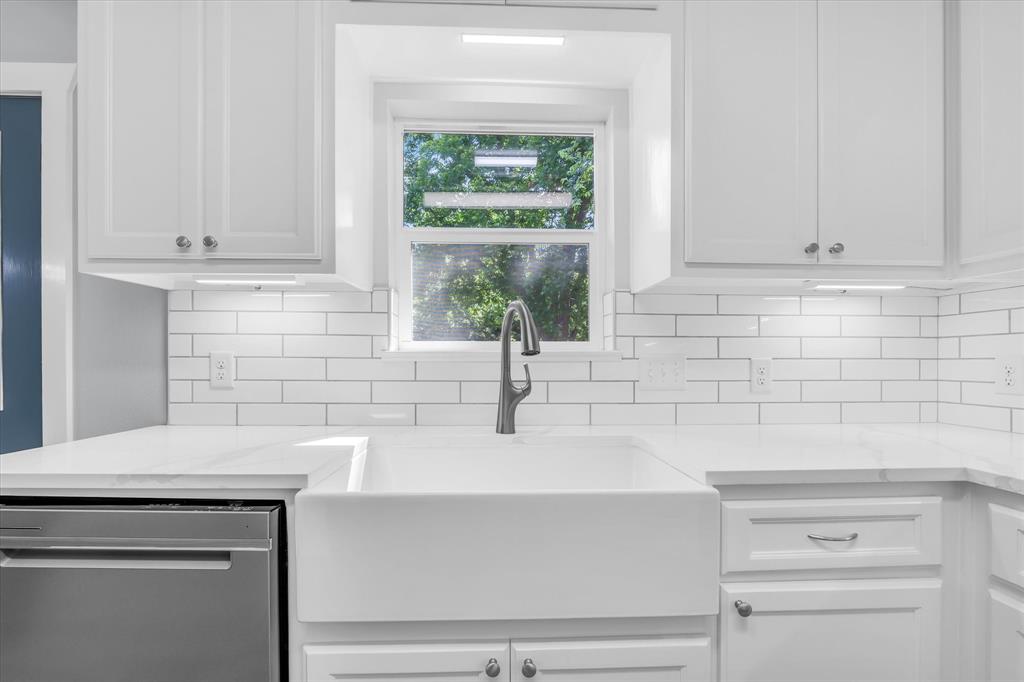 3608 North 26th Street Waco, TX 76708 - Photo 9 of 28 a kitchen with a sink and large window