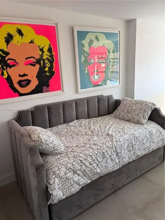 a bathroom with a shower toilet and sink