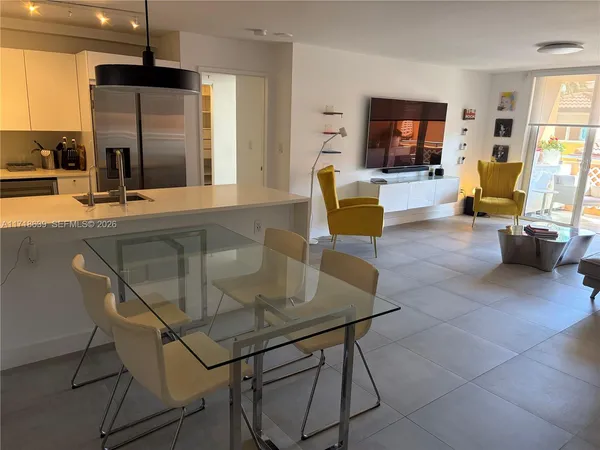 a view of a dining room with furniture