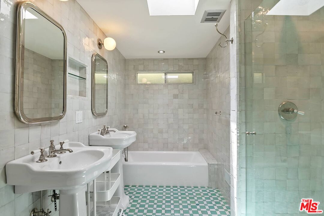 3347 Ley Drive Los Angeles, CA 90027 - Photo 22 of 25 a bathroom with a sink a toilet a mirror and shower