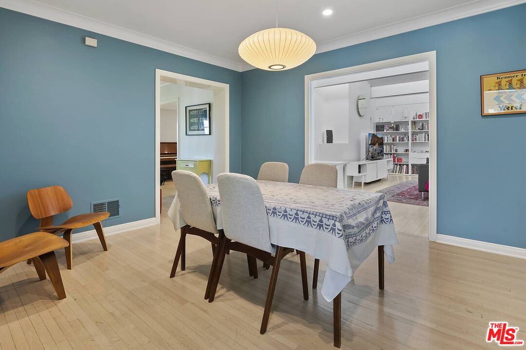 3347 Ley Drive Los Angeles, CA 90027 - Photo 9 of 25 a view of a dining room with furniture and wooden floor