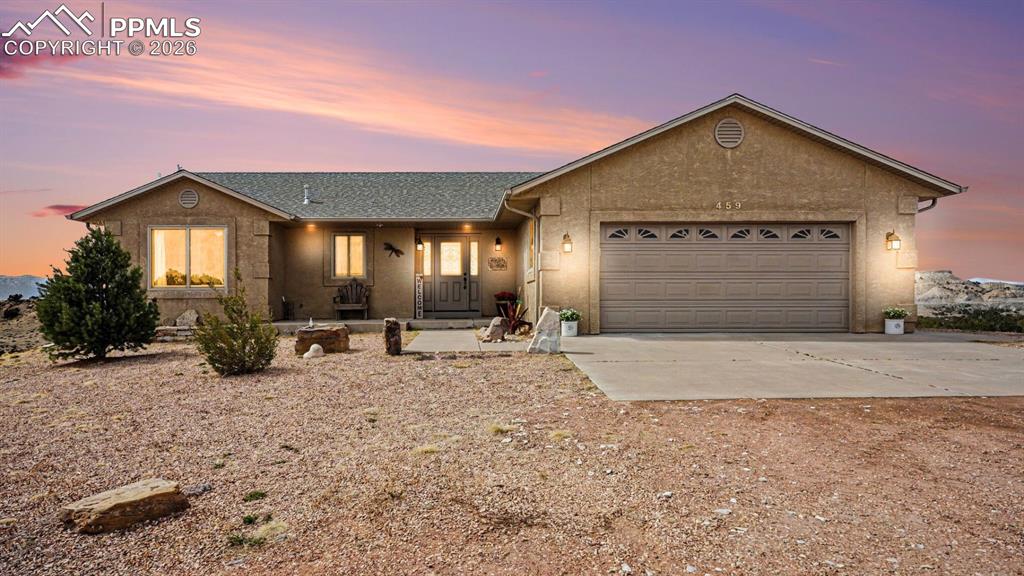 459 Bowie Road Penrose, CO 81240 - Photo 1 of 47 The front yard offers ample space and privacy, blending seamlessly with the surrounding open acreage.