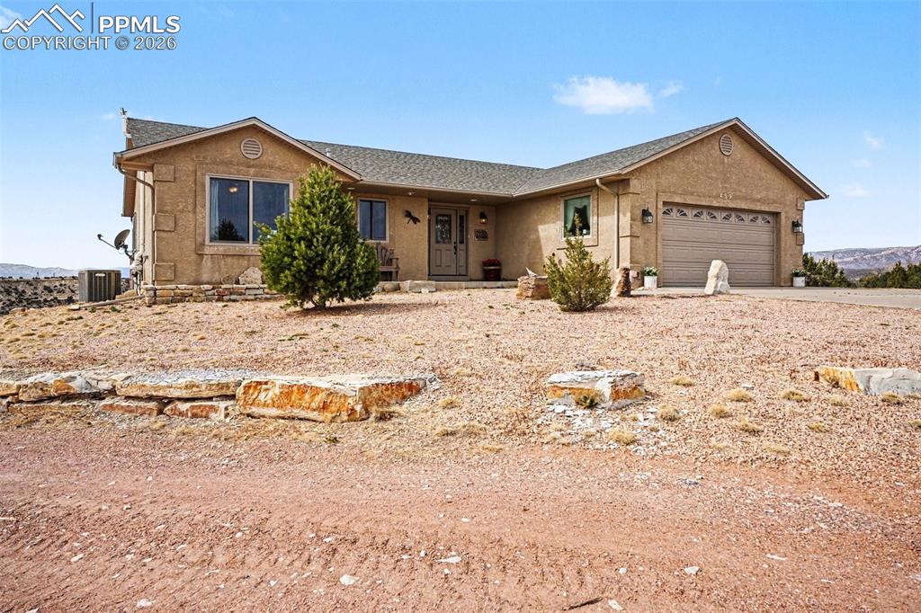 459 Bowie Road Penrose, CO 81240 - Photo 4 of 47 The front yard offers ample space and privacy, blending seamlessly with the surrounding open acreage.