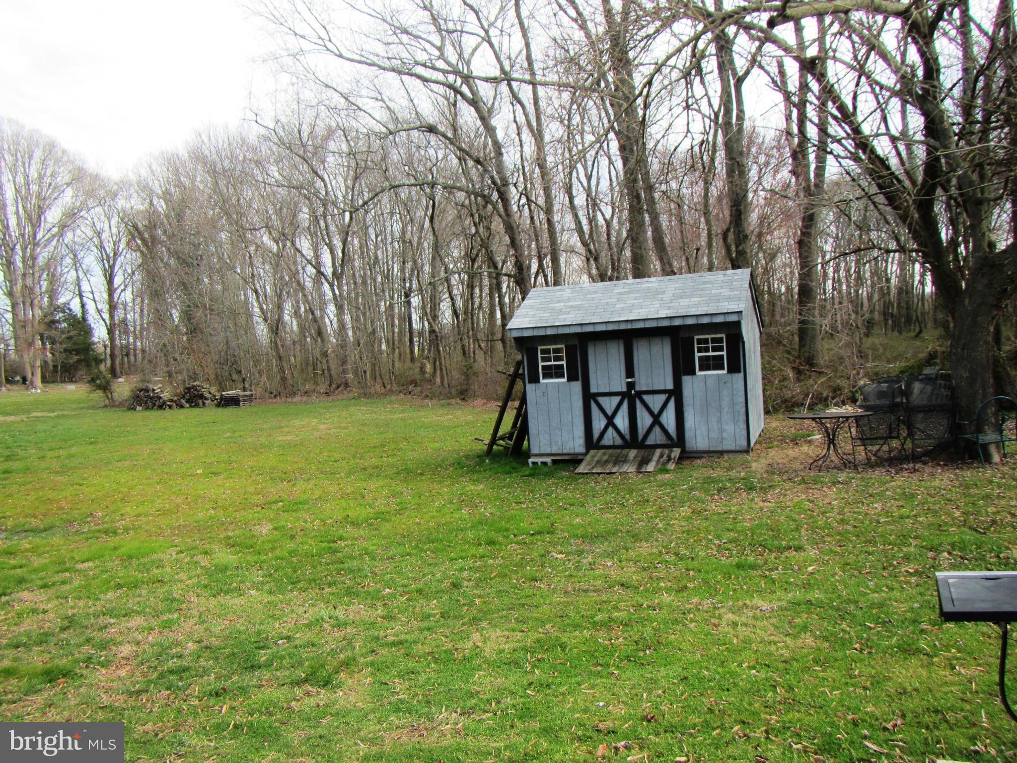 821 Arrington Road Queenstown, MD 21658 - Photo 20 of 25 Shed with riding mower