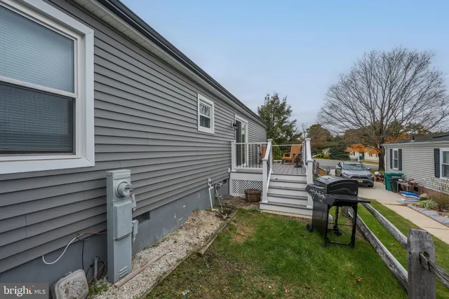 a view of a house with a back yard