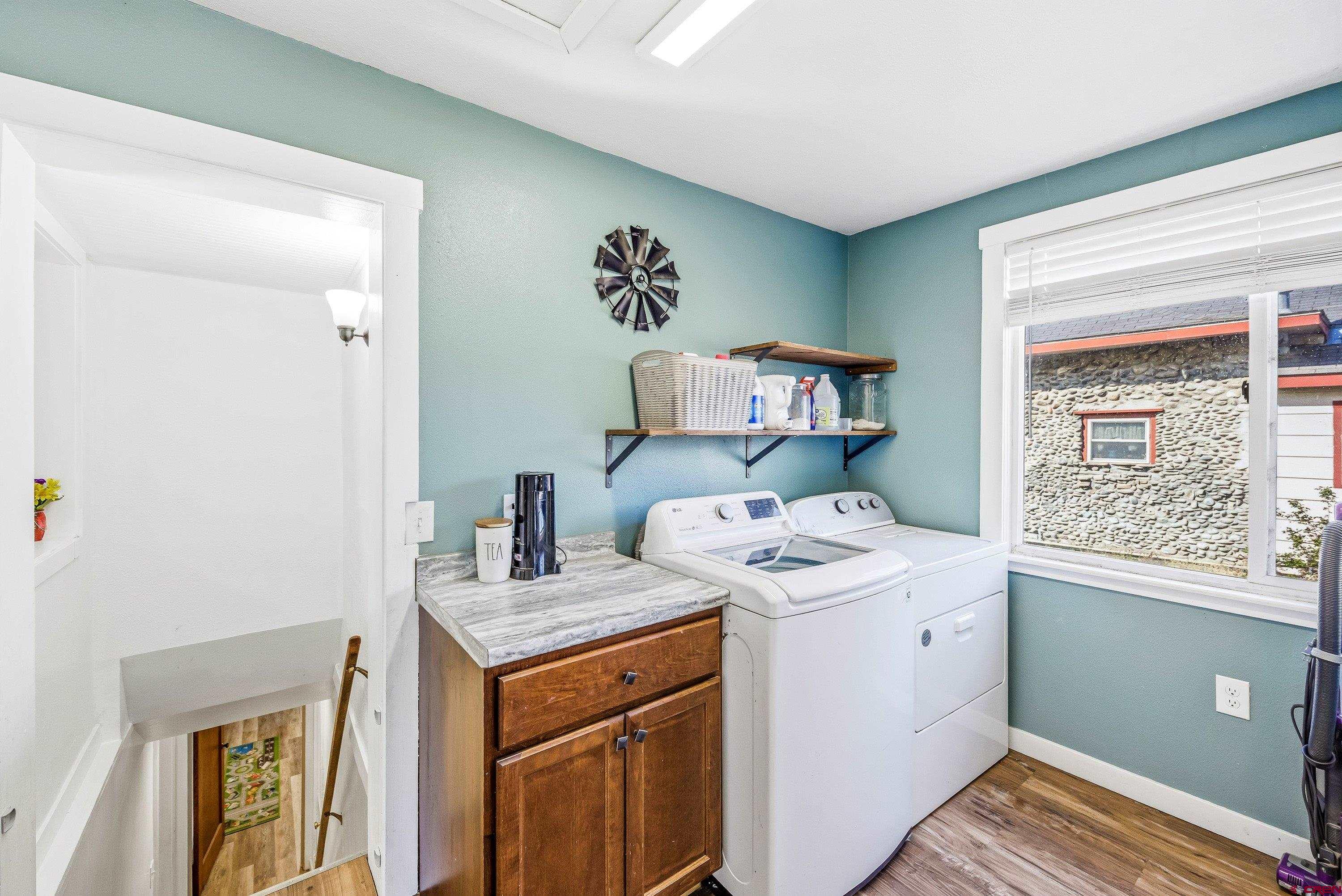 325 East 3rd Street Delta, CO 81416 - Photo 12 of 23 a utility room with dryer and washer