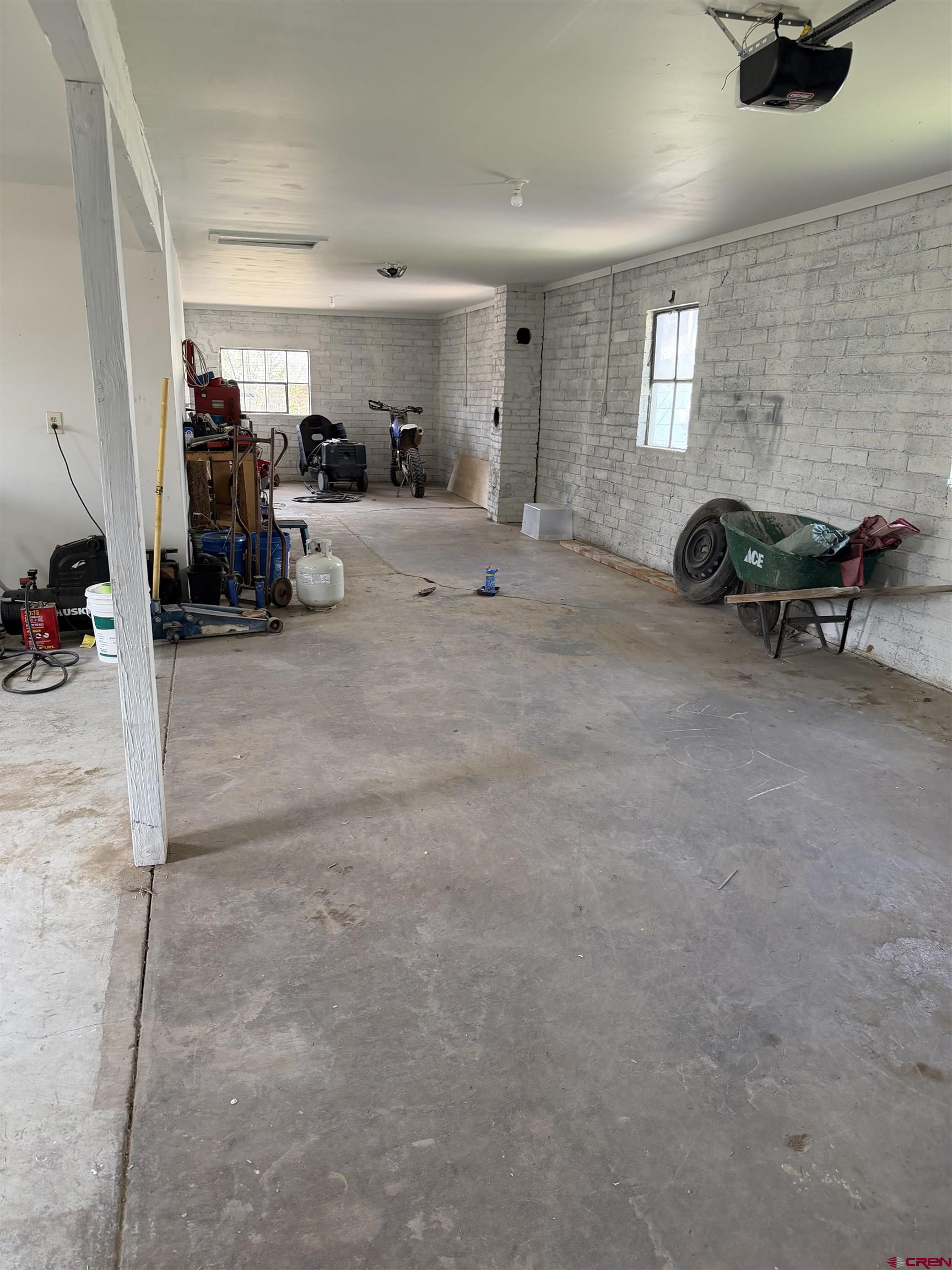 325 East 3rd Street Delta, CO 81416 - Photo 20 of 23 a living room with furniture and a gym machine