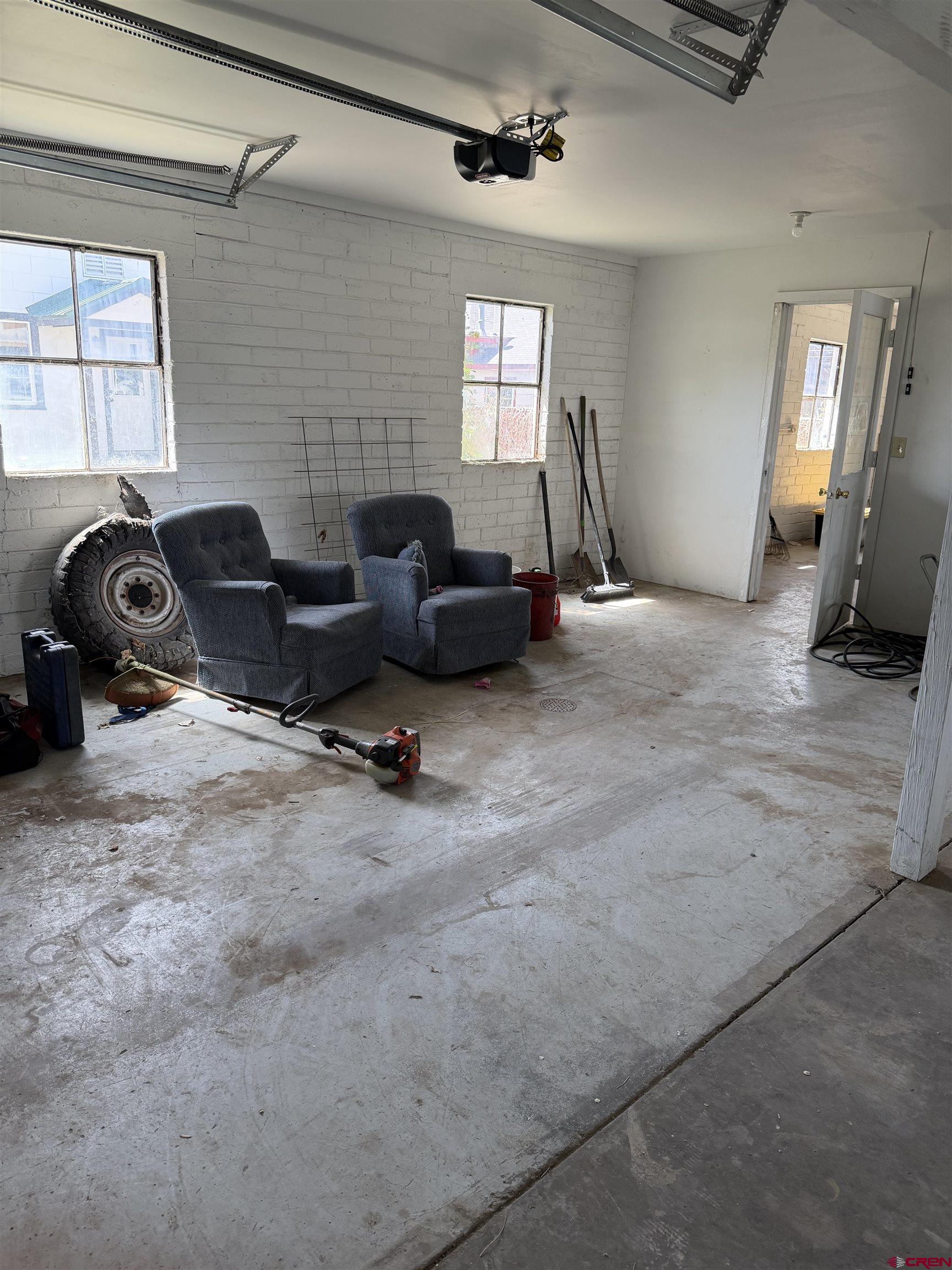 325 East 3rd Street Delta, CO 81416 - Photo 21 of 23 a view of a livingroom with couch and a window