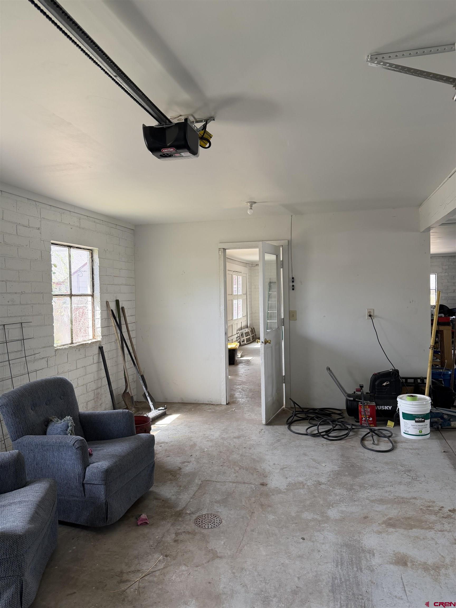 325 East 3rd Street Delta, CO 81416 - Photo 23 of 23 a living room with furniture a window and gym equipment