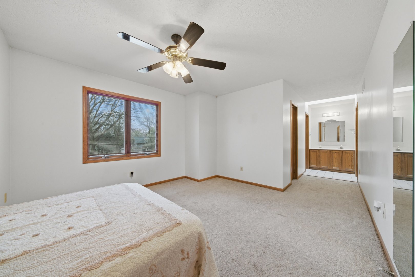 1016 North 7th Street Rochelle, IL 61068 - Photo 20 of 39 a bedroom with a bed and a painting on the wall