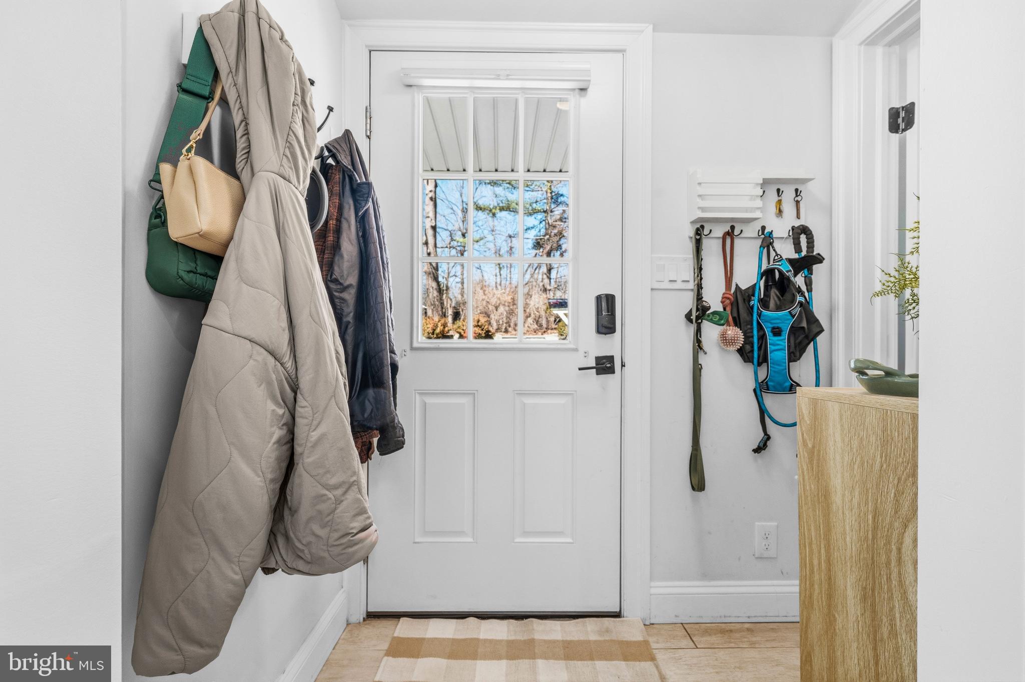 5 Ericsson Road Cabin John, MD 20818 - Photo 6 of 56 a view of walk in closet with clothes and shoes