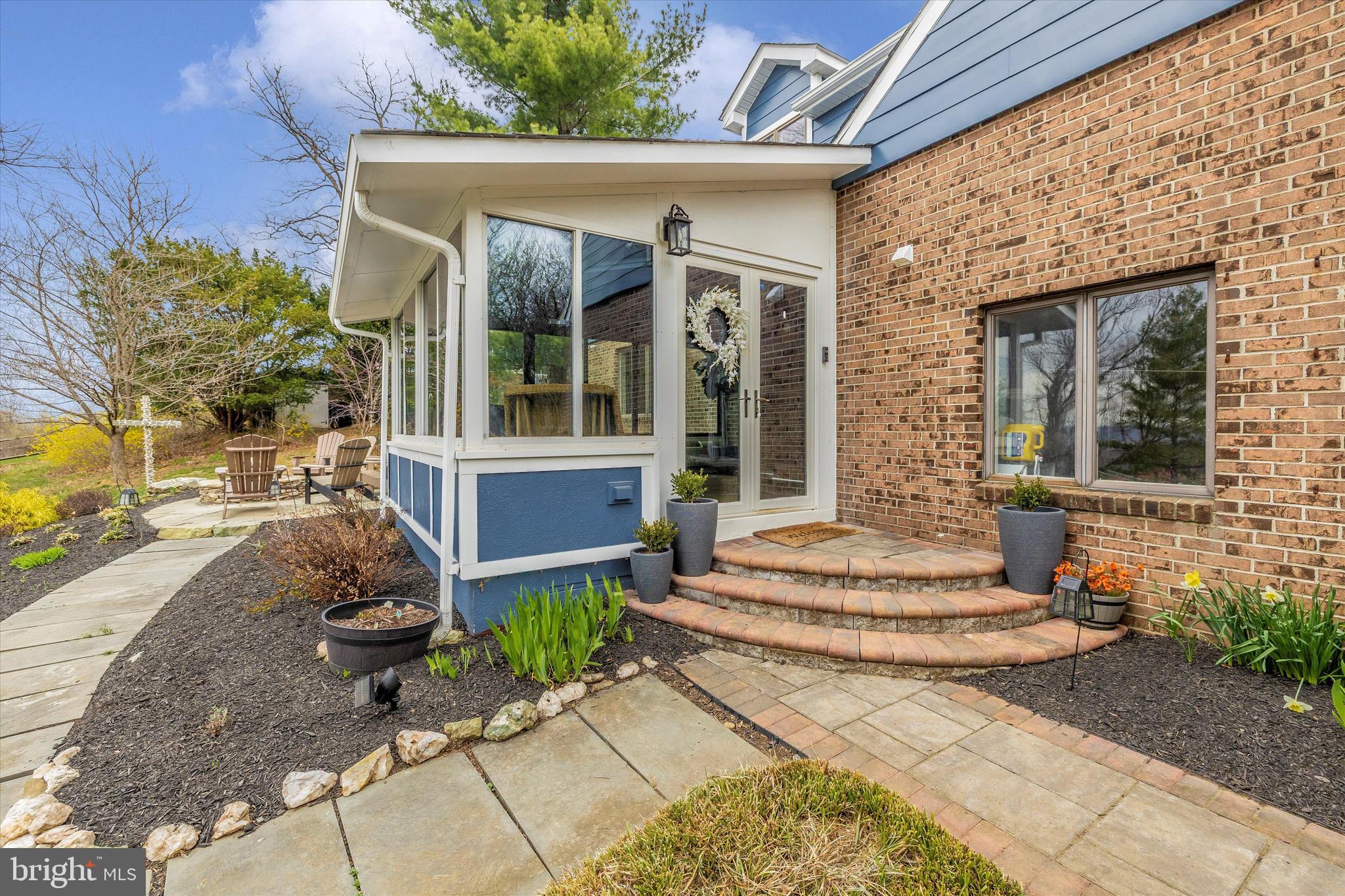 4426 Teen Barnes Road Frederick, MD 21703 - Photo 2 of 76 a view of a house with outdoor seating space