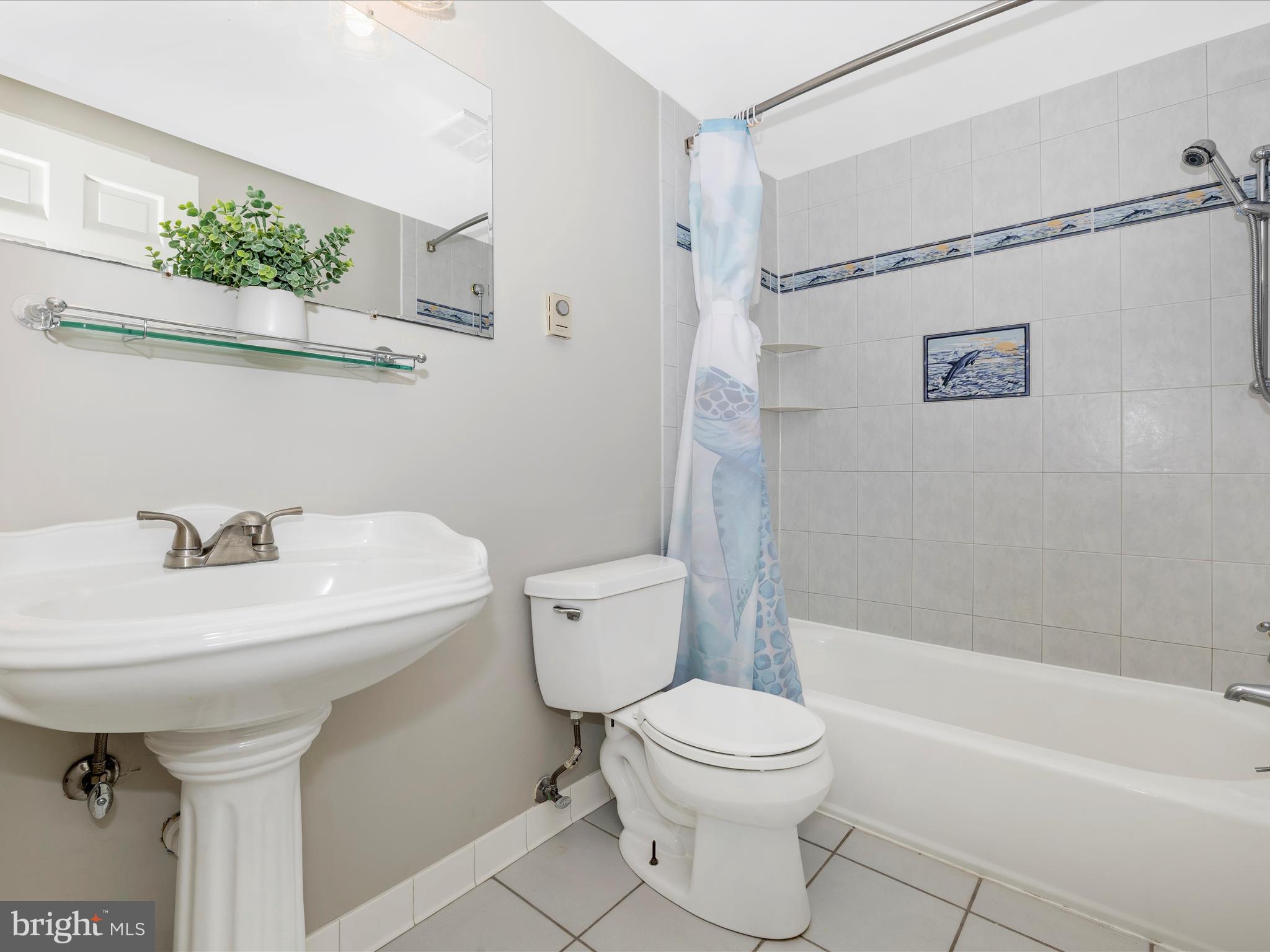 4426 Teen Barnes Road Frederick, MD 21703 - Photo 40 of 76 a bathroom with a sink a toilet and shower