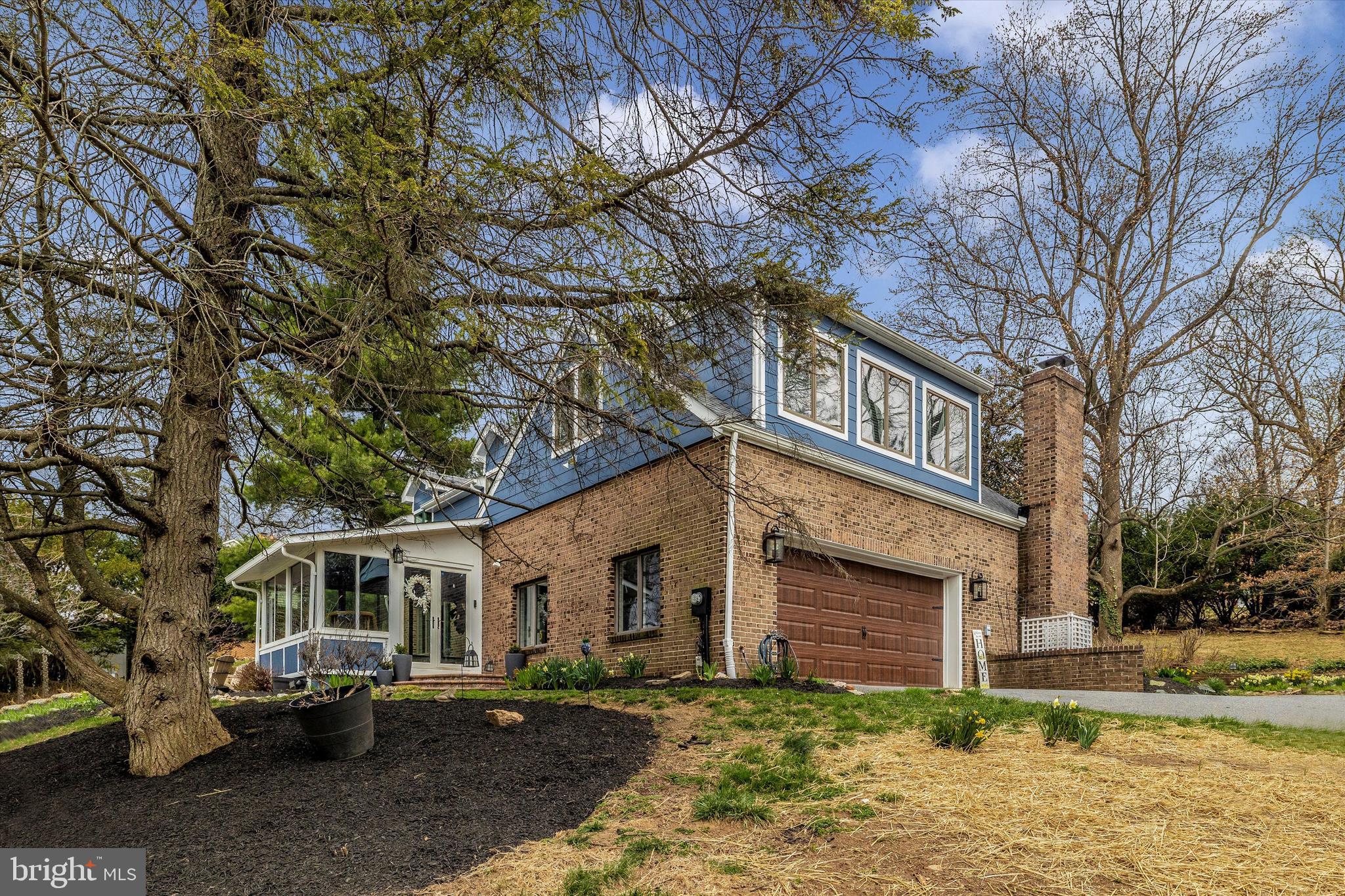 4426 Teen Barnes Road Frederick, MD 21703 - Photo 48 of 76 a front view of a house with a yard