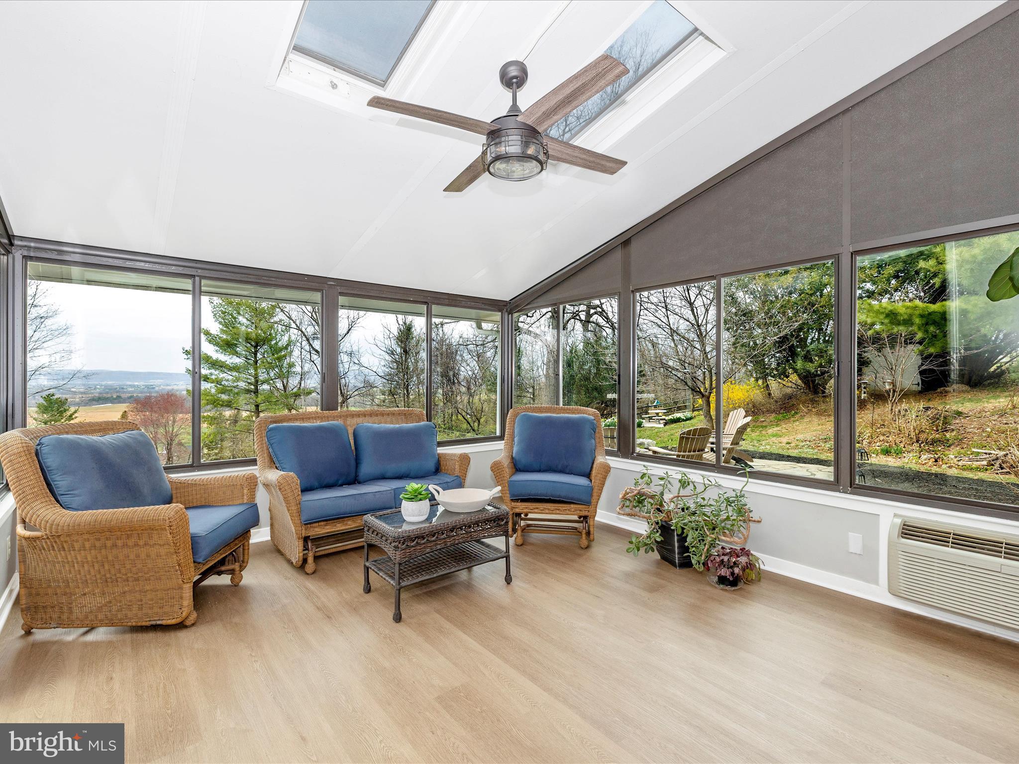4426 Teen Barnes Road Frederick, MD 21703 - Photo 5 of 76 a living room with furniture and a floor to ceiling window