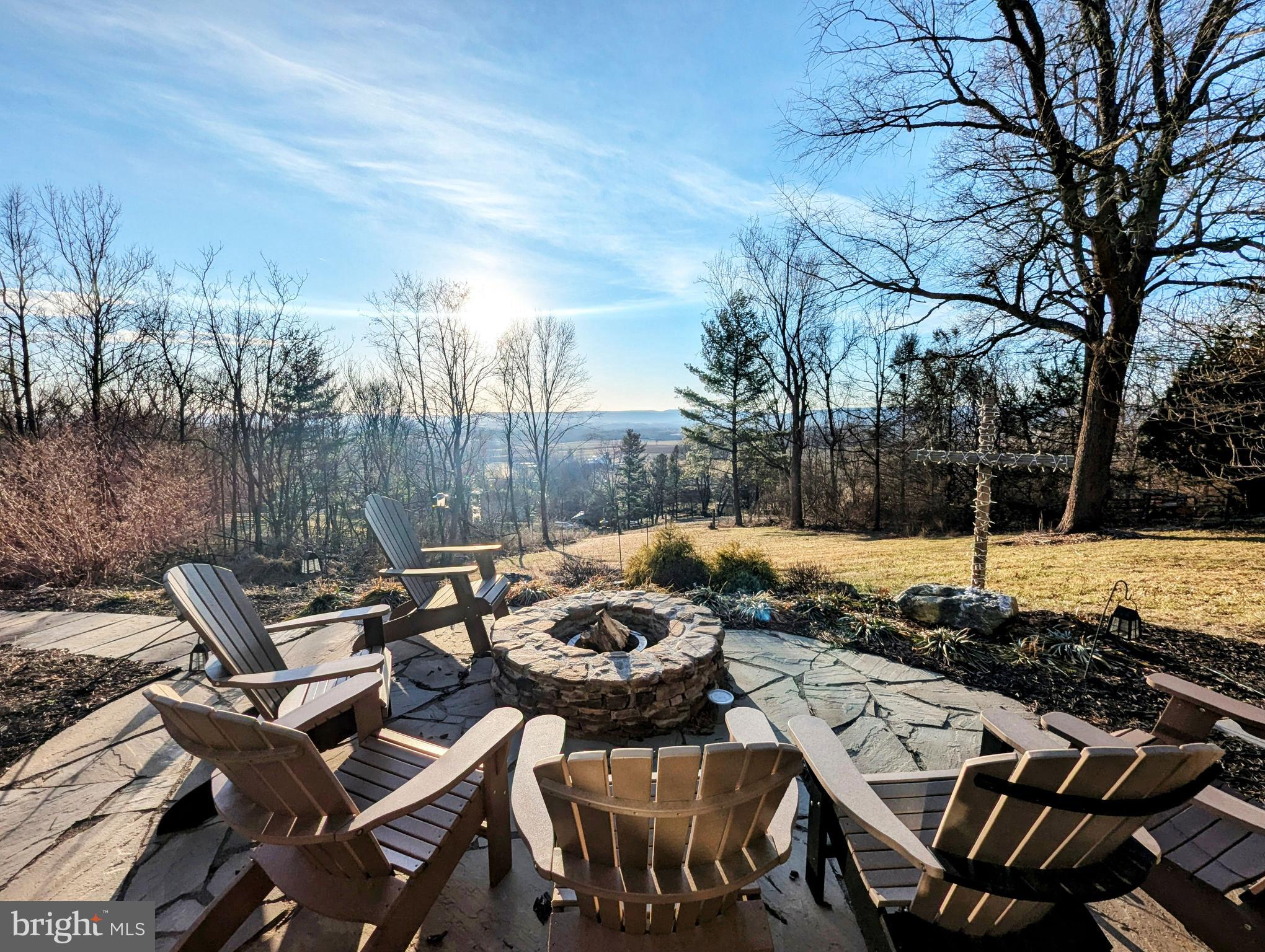 4426 Teen Barnes Road Frederick, MD 21703 - Photo 52 of 76 a view of a patio with table and chairs and couches