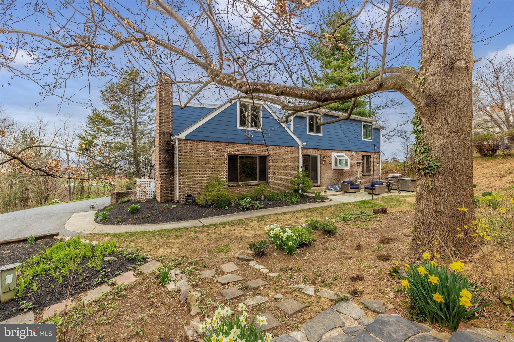 4426 Teen Barnes Road Frederick, MD 21703 - Photo 54 of 76 a front view of a house with a yard