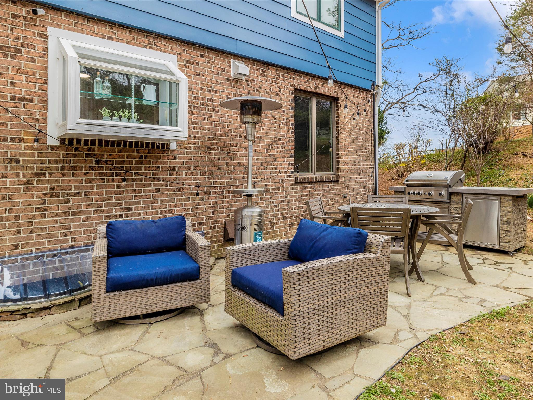 4426 Teen Barnes Road Frederick, MD 21703 - Photo 57 of 76 a outdoor space with patio furniture and a fireplace