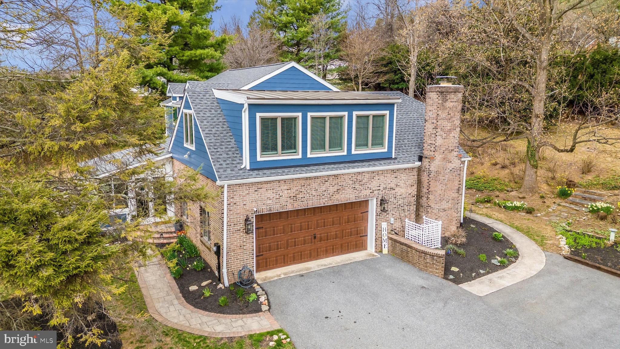 4426 Teen Barnes Road Frederick, MD 21703 - Photo 70 of 76 a front view of a house with garden