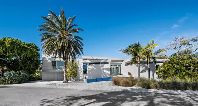 a view of a living room and chandelier