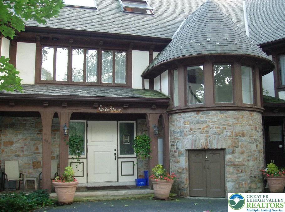 444 West 3rd Street, Unit 9 Bethlehem, PA 18015 - Photo 2 of 16 Timeless stone construction and distinctive turret architecture characterize this enchanting Tudor-style residence.