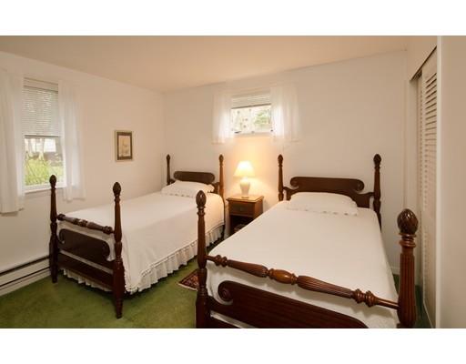 15 Bayview Road Marion, MA 02738 - Photo 13 of 24 a bedroom with two beds and painting on the wall