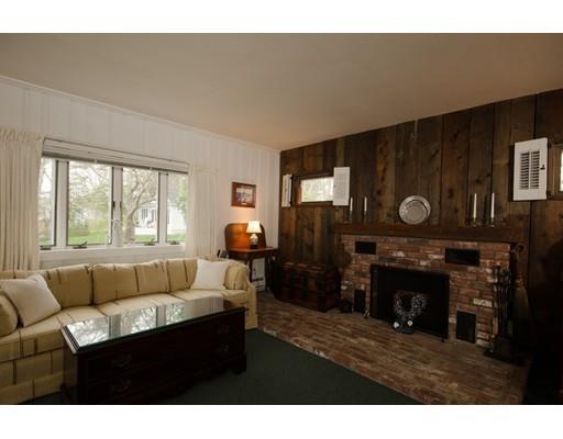 15 Bayview Road Marion, MA 02738 - Photo 6 of 24 a living room with furniture and a fireplace