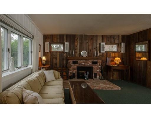 15 Bayview Road Marion, MA 02738 - Photo 7 of 24 a living room with furniture and a fireplace