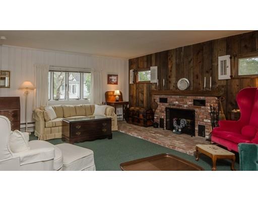 15 Bayview Road Marion, MA 02738 - Photo 8 of 24 a living room with furniture and a fireplace