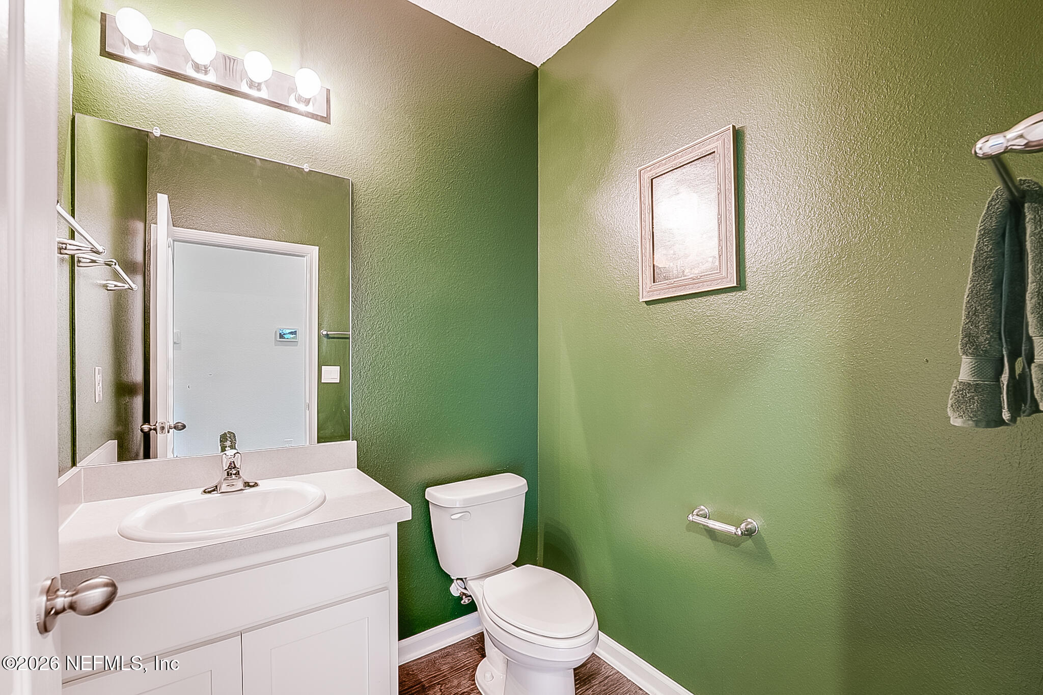 266 Caminha Road St. Augustine, FL 32084 - Photo 13 of 57 a bathroom with a sink mirror and toilet