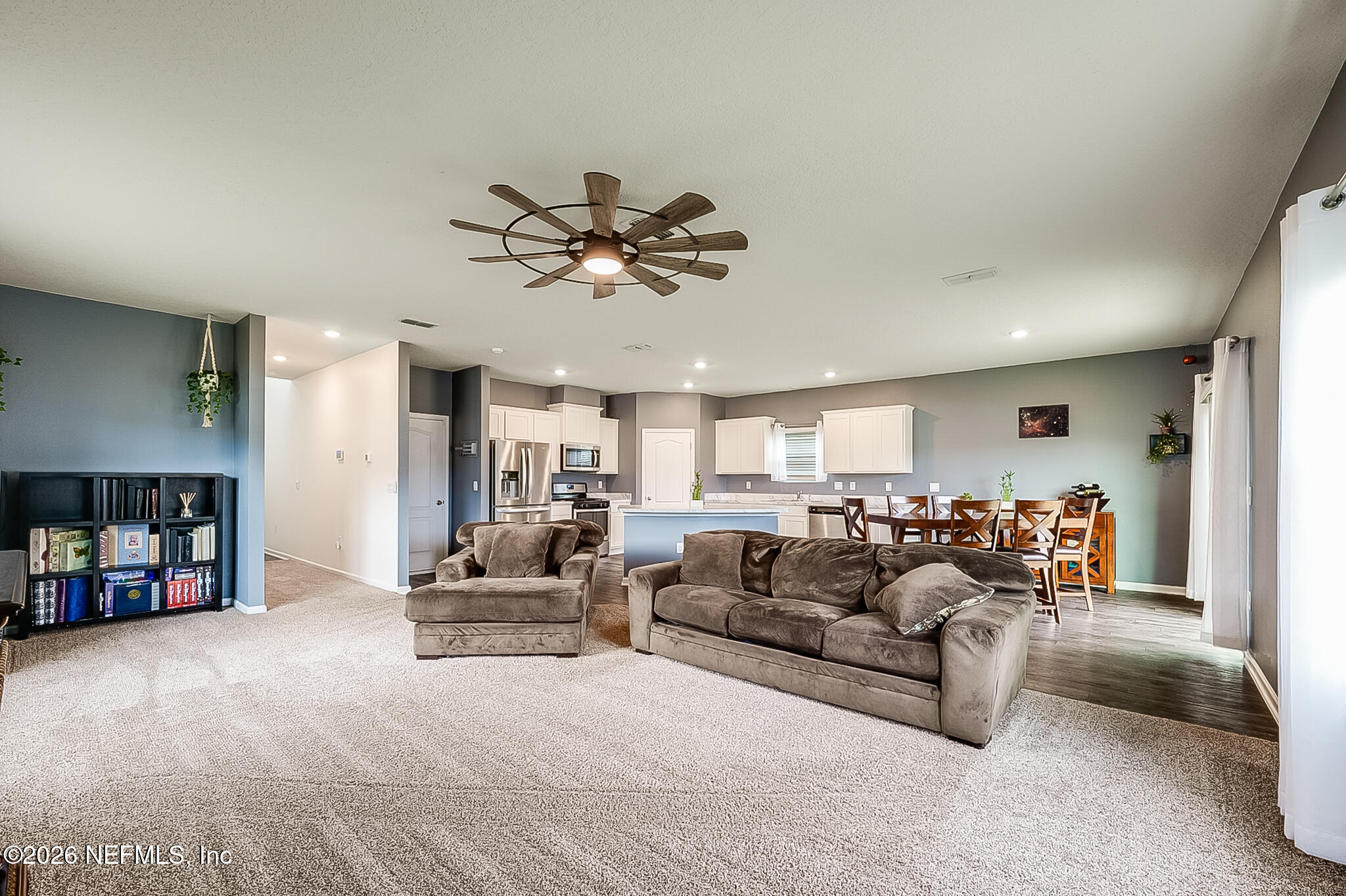 266 Caminha Road St. Augustine, FL 32084 - Photo 14 of 57 a living room with furniture and a flat screen tv