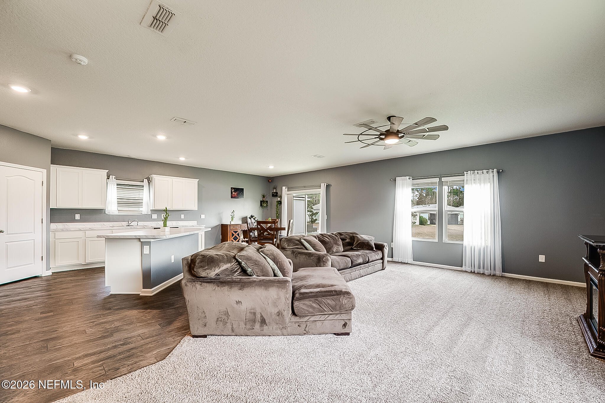 266 Caminha Road St. Augustine, FL 32084 - Photo 2 of 57 a living room with furniture and a large window