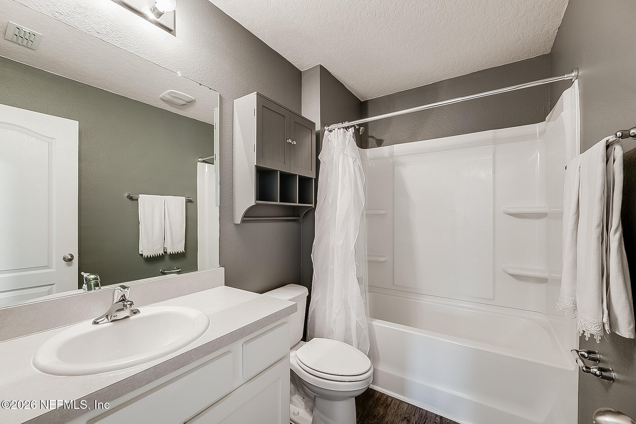 266 Caminha Road St. Augustine, FL 32084 - Photo 25 of 57 a bathroom with a sink toilet and shower