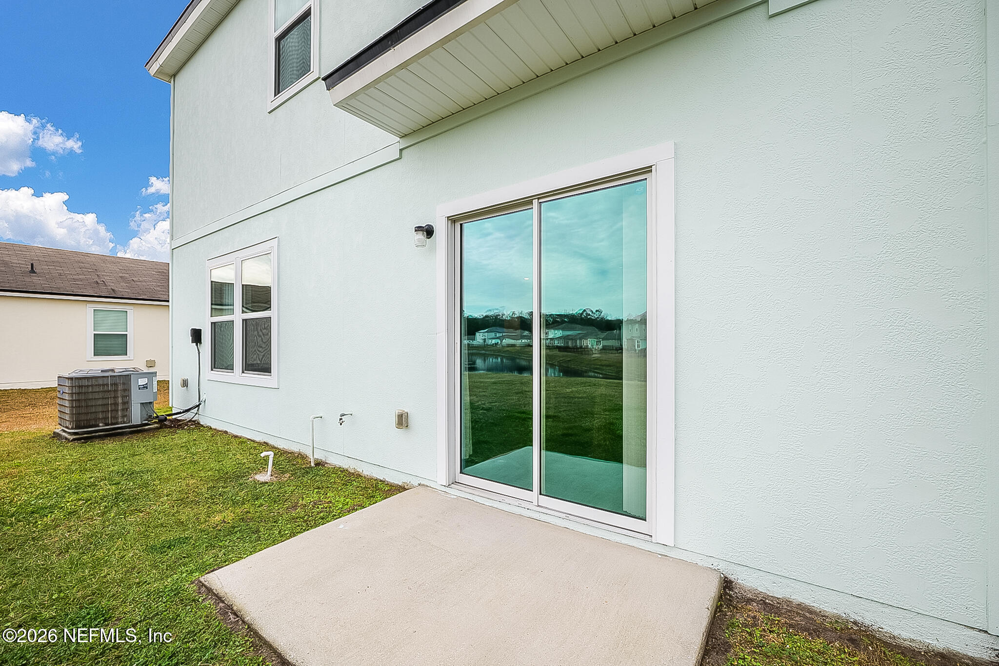 266 Caminha Road St. Augustine, FL 32084 - Photo 38 of 57 a view of a backyard with a garden and plants