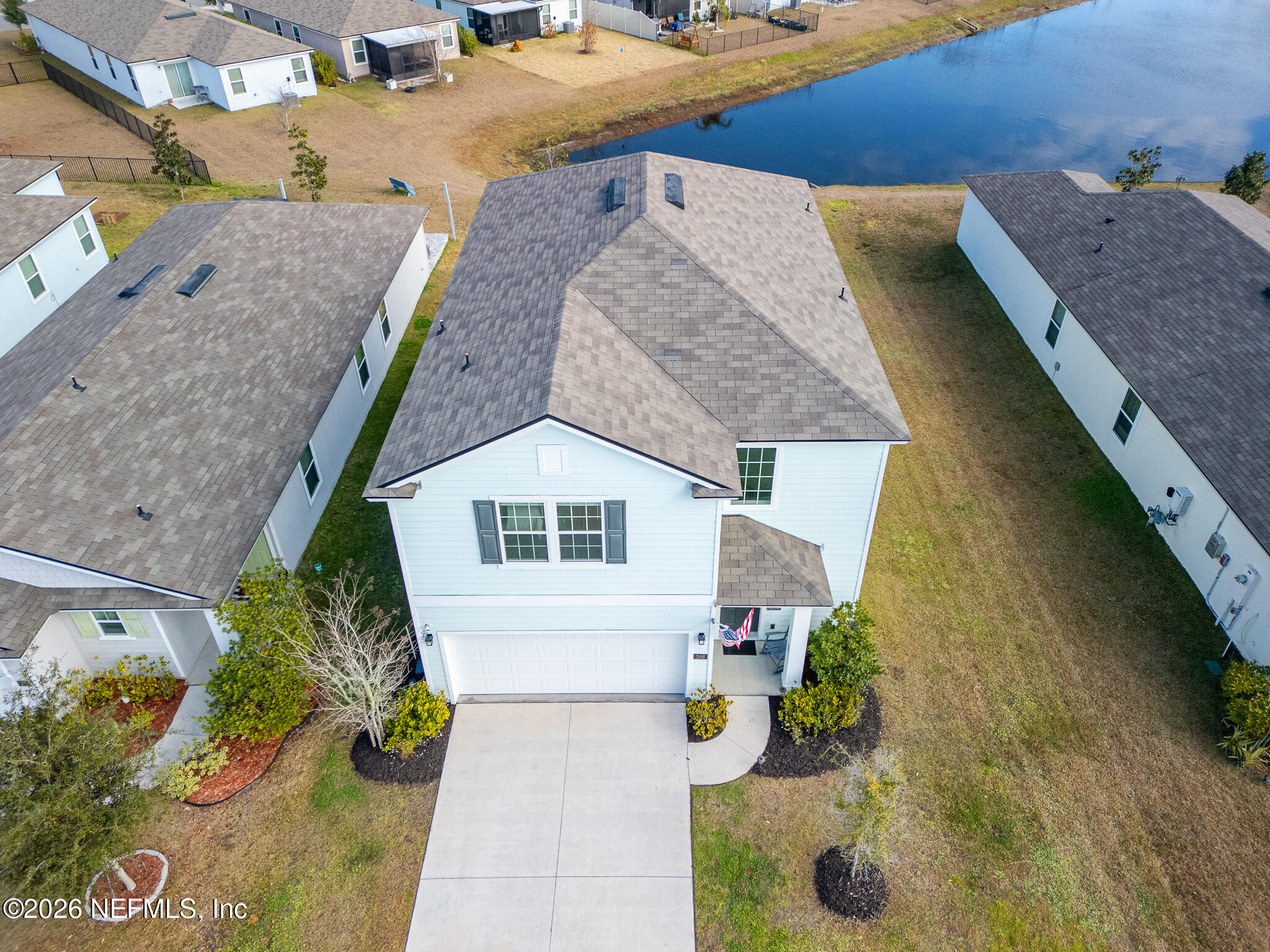266 Caminha Road St. Augustine, FL 32084 - Photo 43 of 57 a aerial view of a house with yard and sitting area