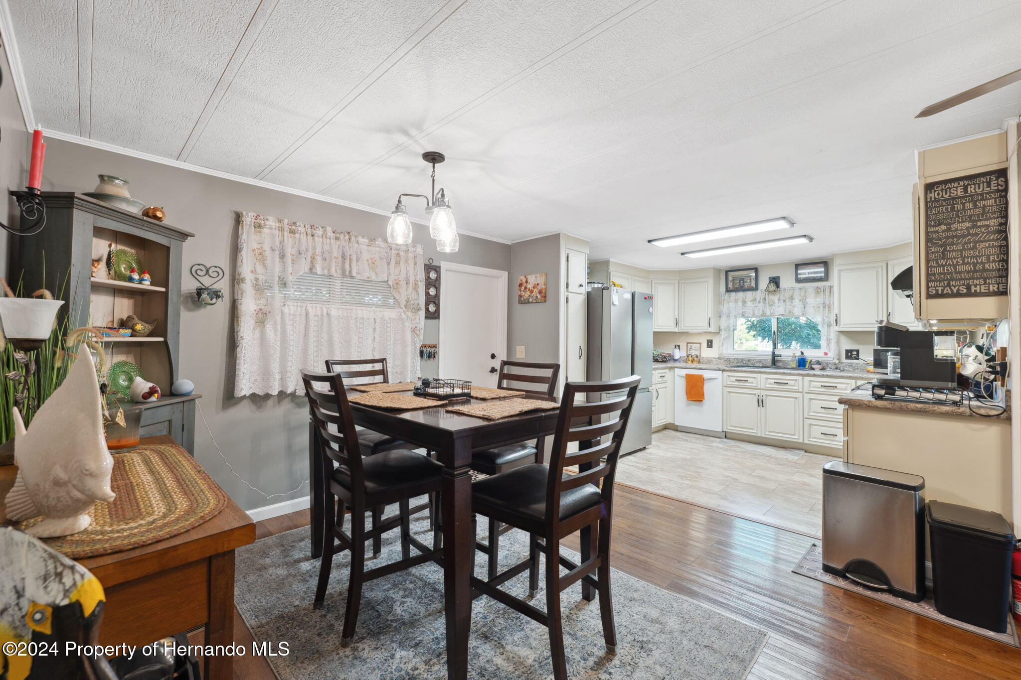 15116 Rialto Avenue Brooksville, FL 34613 - Photo 16 of 36 a view of a dining room with furniture