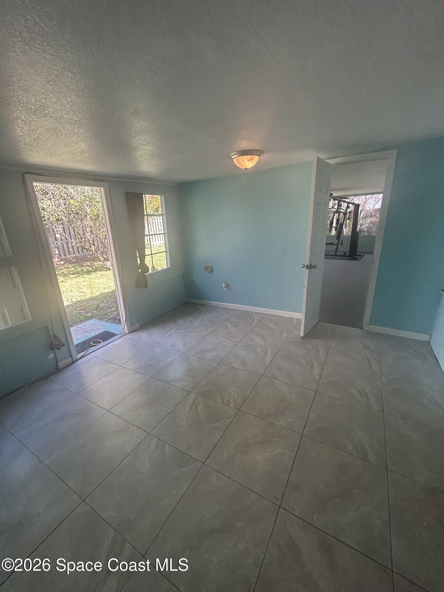 180 Richards Road Melbourne Beach, FL 32951 - Photo 30 of 32 a view of an empty room with a window