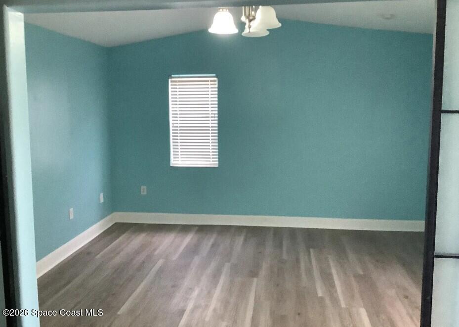 180 Richards Road Melbourne Beach, FL 32951 - Photo 4 of 32 a view of an empty room and chandelier fan