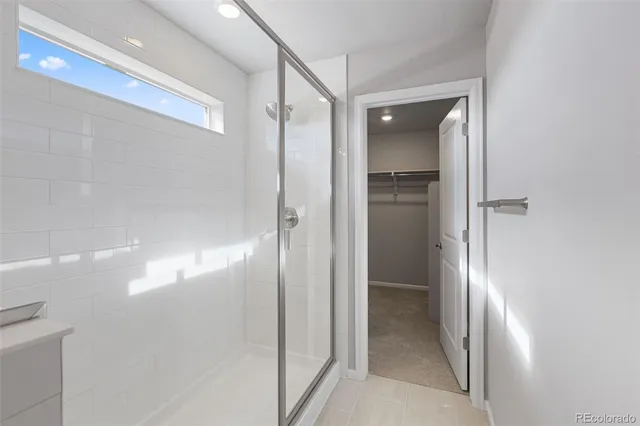 a view of an empty walk in closet