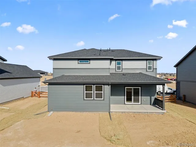 a front view of a house with a garage