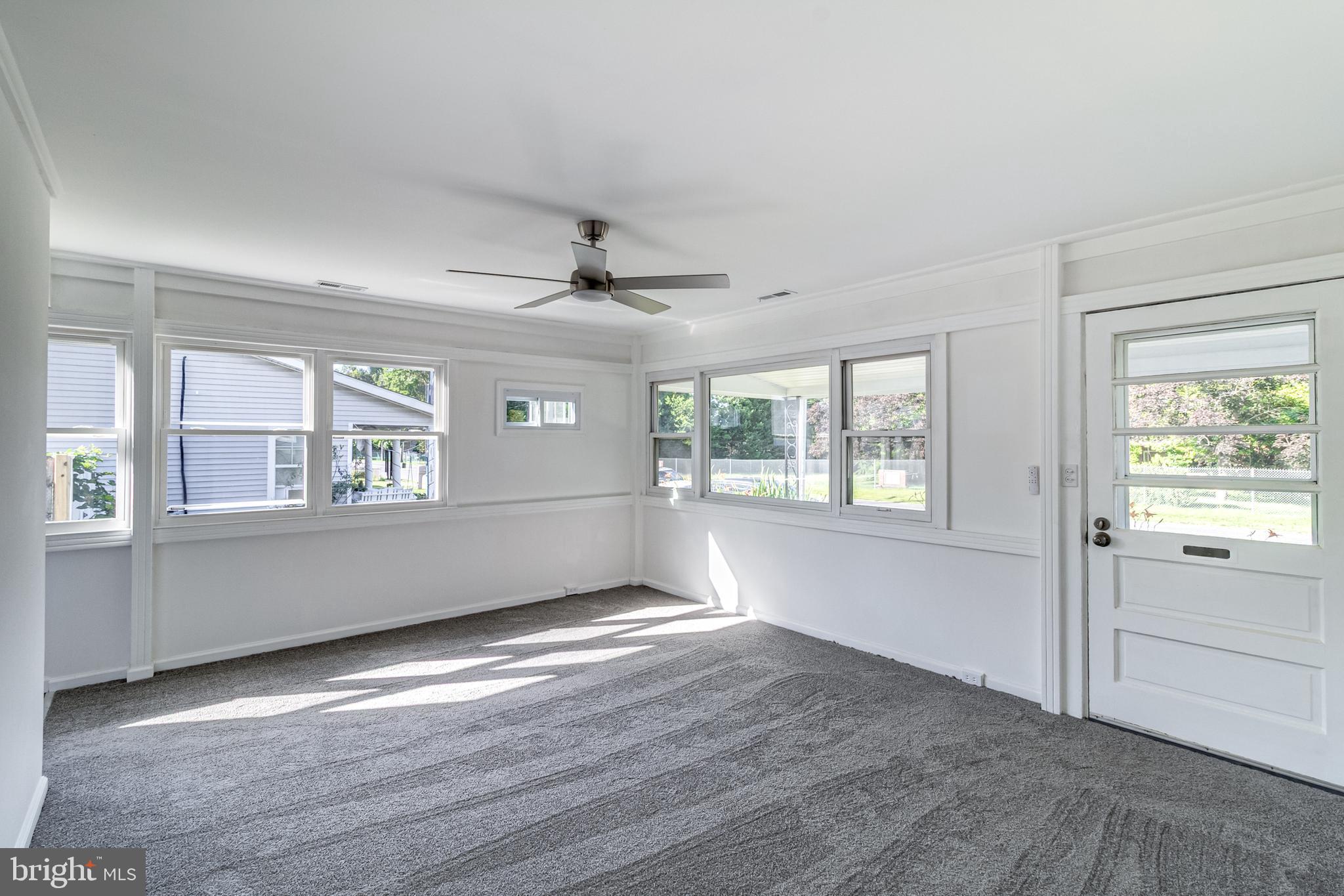 1318 Wilson Point Road Baltimore, MD 21220 - Photo 4 of 26 Living Room with New Carpeting