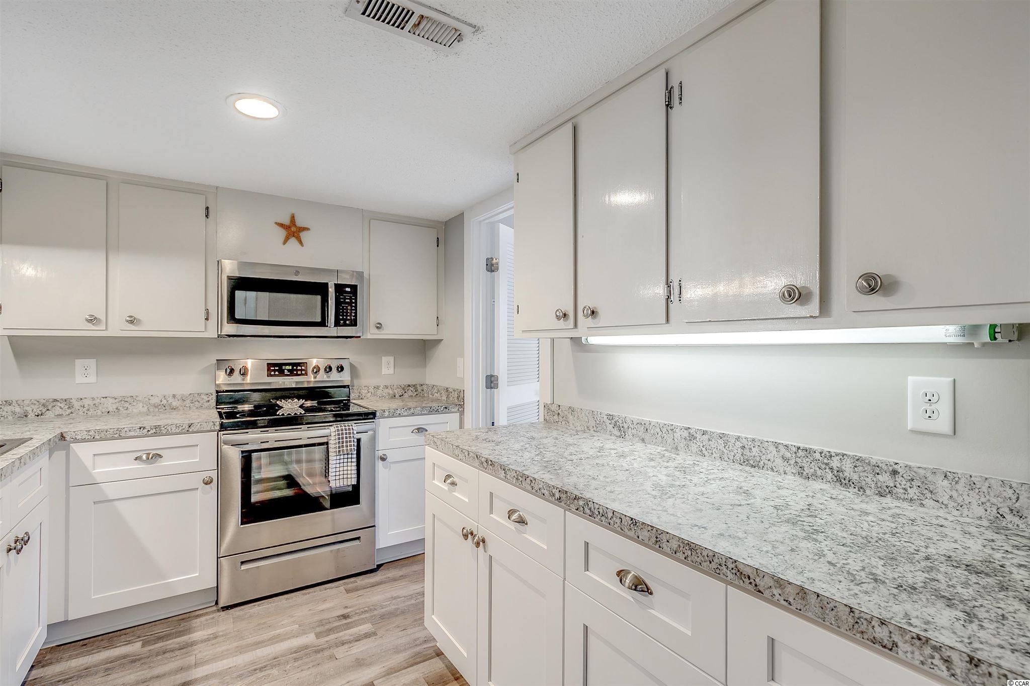 82 Inlet Point Drive, Unit 9D Pawleys Island, SC 29585 - Photo 6 of 40 Gallery Image 6