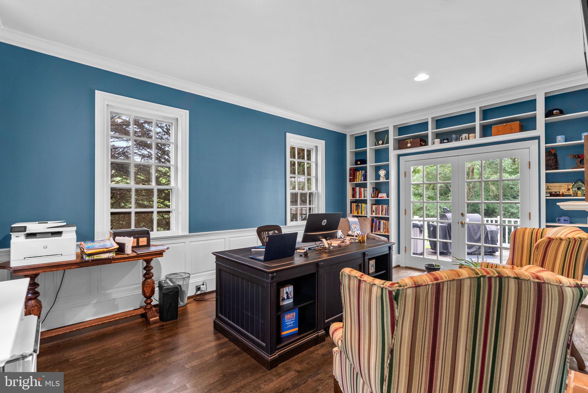 10306 Cutters Lane Potomac, MD 20854 - Photo 26 of 76 a view of a workspace with furniture and a window