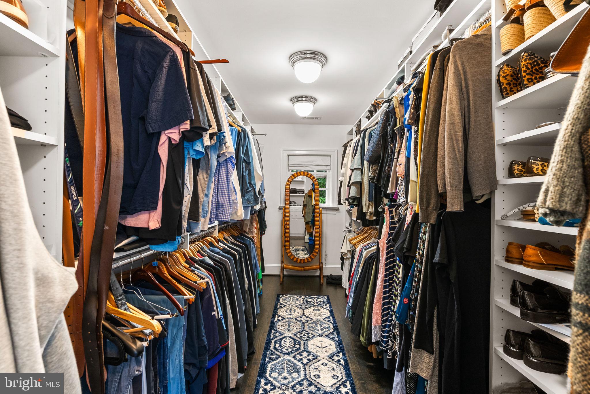 10306 Cutters Lane Potomac, MD 20854 - Photo 35 of 76 a view of walk in closet with clothes and shoes