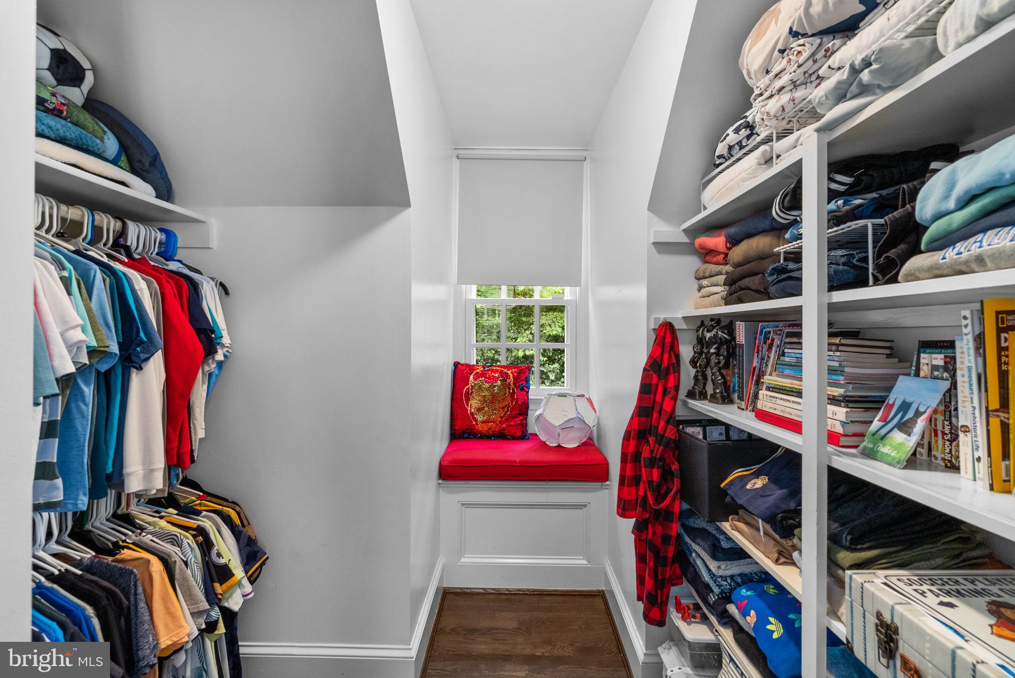 10306 Cutters Lane Potomac, MD 20854 - Photo 41 of 76 a view of walk in closet with clothes and shoes
