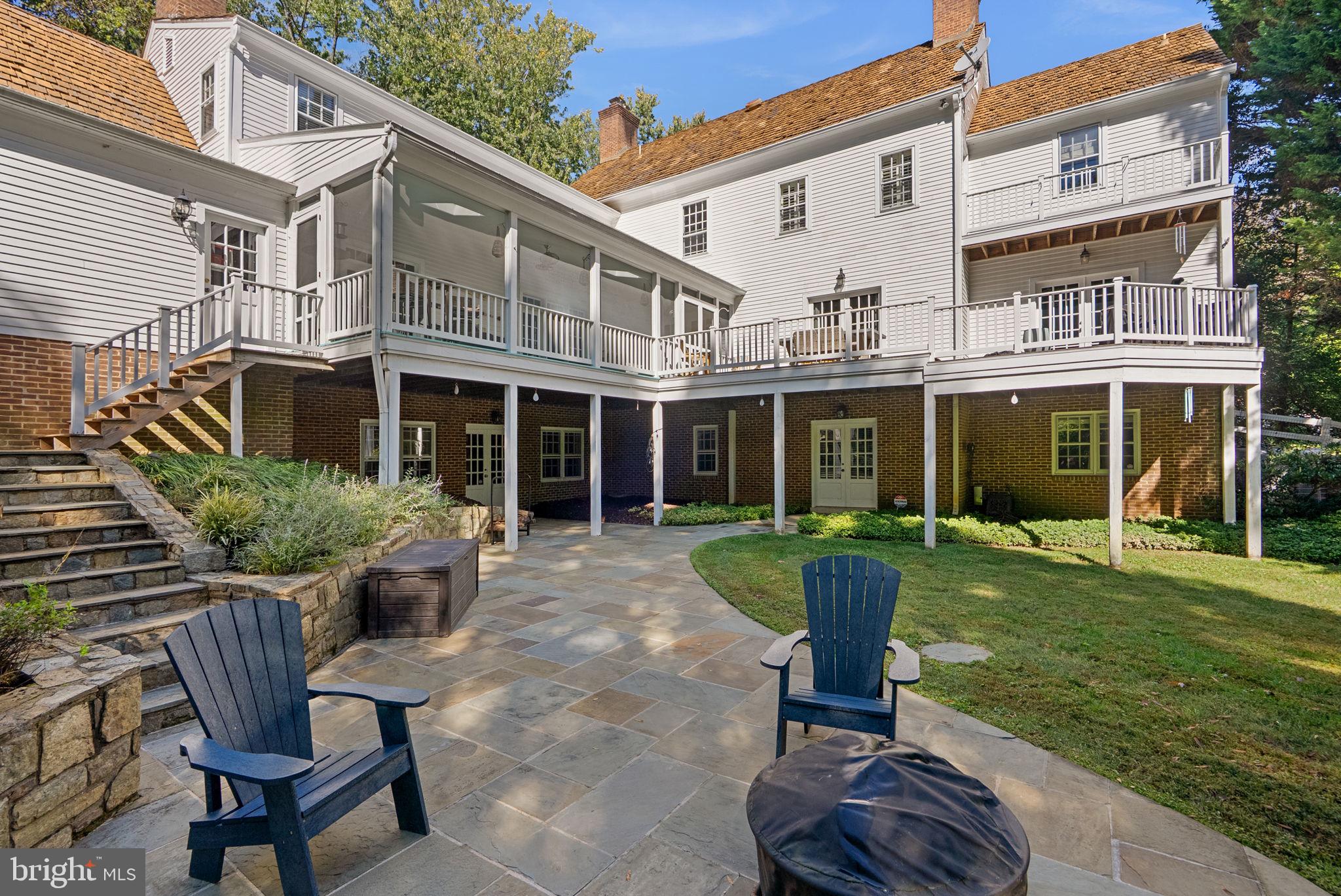 10306 Cutters Lane Potomac, MD 20854 - Photo 67 of 76 a view of a house with backyard sitting area and garden